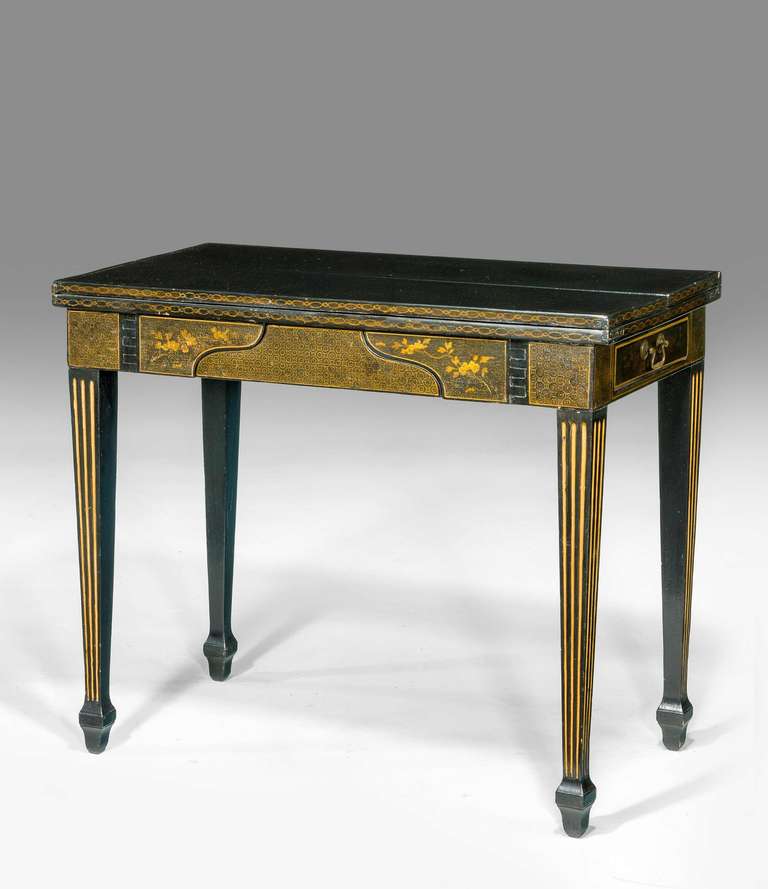 Chinese, for the European market. Beautifully lacquered 19th century games table, incorporating chess board and backgammon within the central compartment. Finely gilded to the edges and supports. In overall fine condition.

