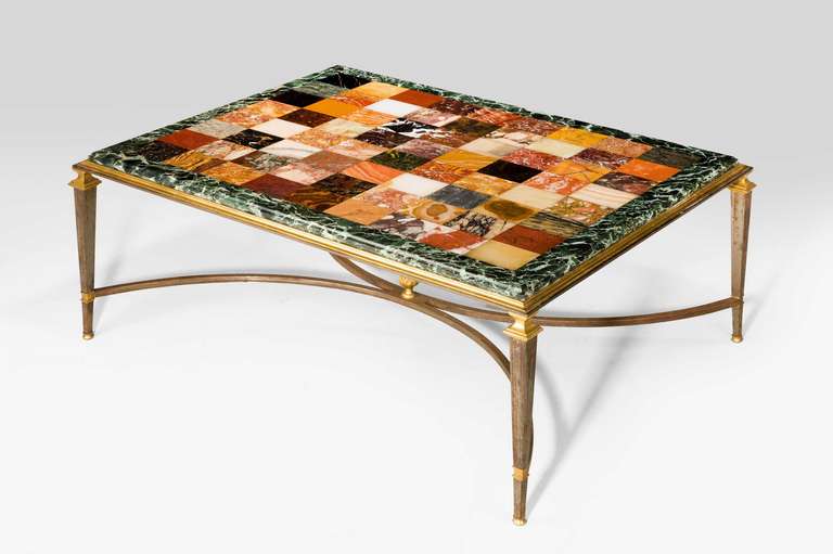 A fine Italian specimen marble top Table, now with gilt bronze supports. Most likely Paris the top late 19th century the frame mid-20th century,

RR.