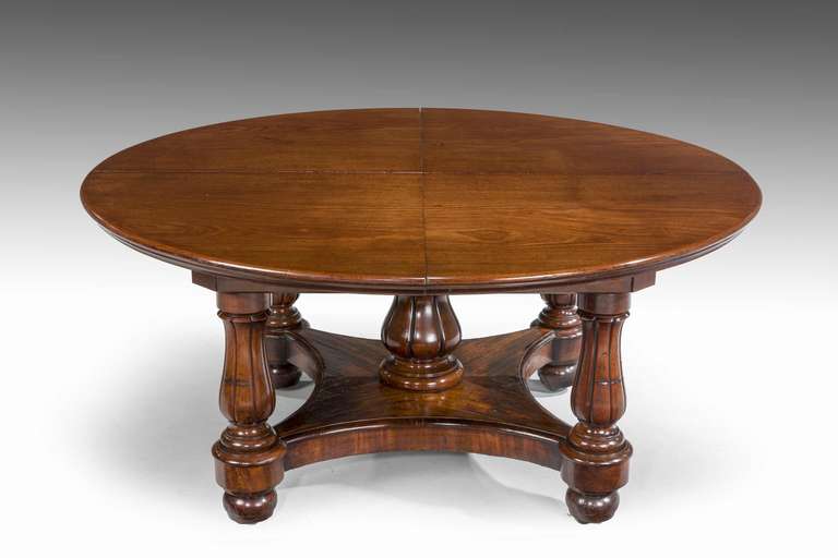 An important late Regency metamorphic mahogany dining table in quite exceptional original condition including the clips and hardware.

Measurements:
Closed- 62