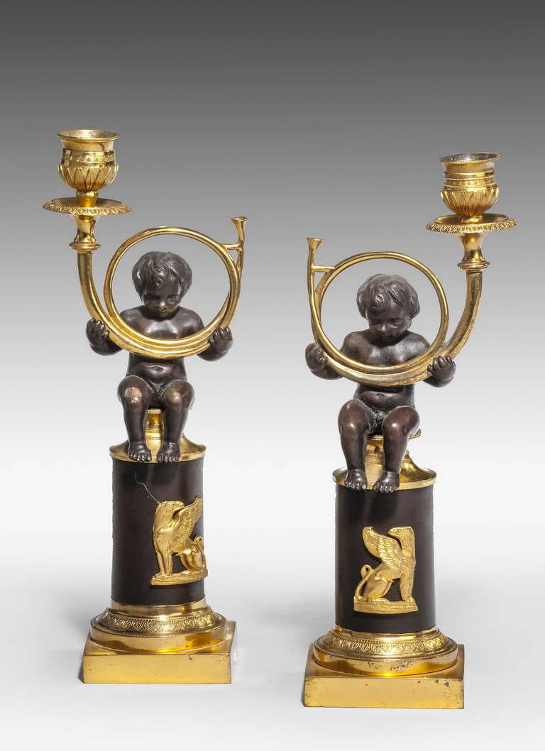 British Pair of Regency Period Putti Candlesticks