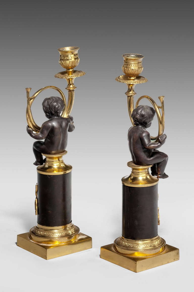 19th Century Pair of Regency Period Putti Candlesticks