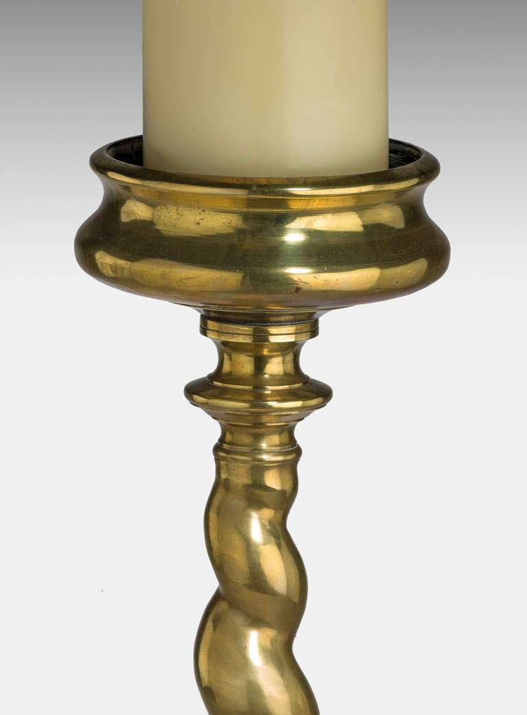 Massive cast candle pricket of early 17th design but made in the 19th century.

Provenance:
The earliest European candlesticks consisted of a candle impaled upon an iron spike called a pricket which projected from a block of wood. In the 13th