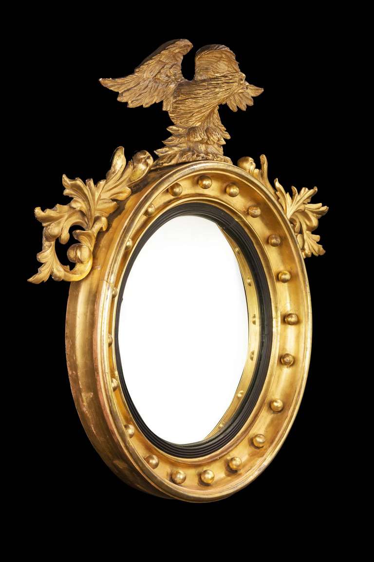 English Regency Period Convex Mirror with Carved Foliage and Eagle