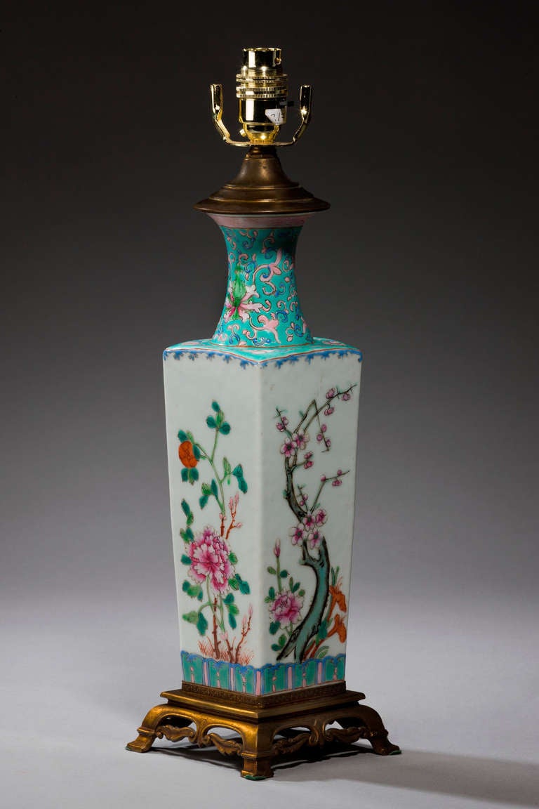 Canton porcelain square vase with peonies and cherry blossom enamelled decoration with custom-made bronze base and mounts.

Shades are not included in the price of our lamps. We do have a competitively priced range of shades for all of our lamps.