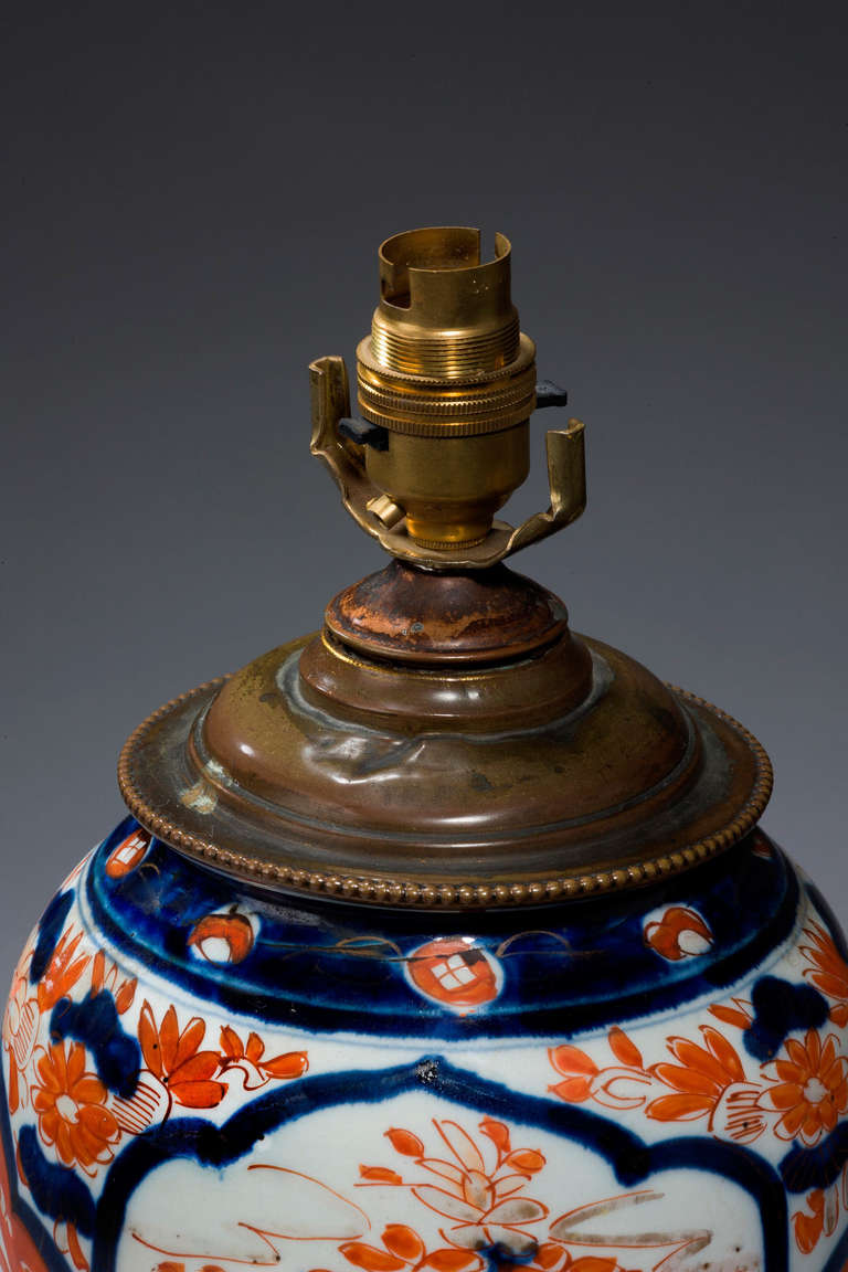 Japanese Imari ovoid porcelain vase lamp with original bronze base.

Imari began to be exported to Europe, because the Chinese kilns at Ching-te-Chen were damaged in the political chaos and the new Qing dynasty government stopped trade in 1656-1684.