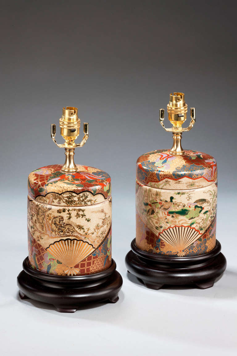 Pair of crackle ware pottery Lamps of squat cylinder form, gilded and enamelled decoration with oriental ducks, fans and foliage. Modern.

Shades are not included in the price of our lamps. We do have a competitively priced range of shades for all