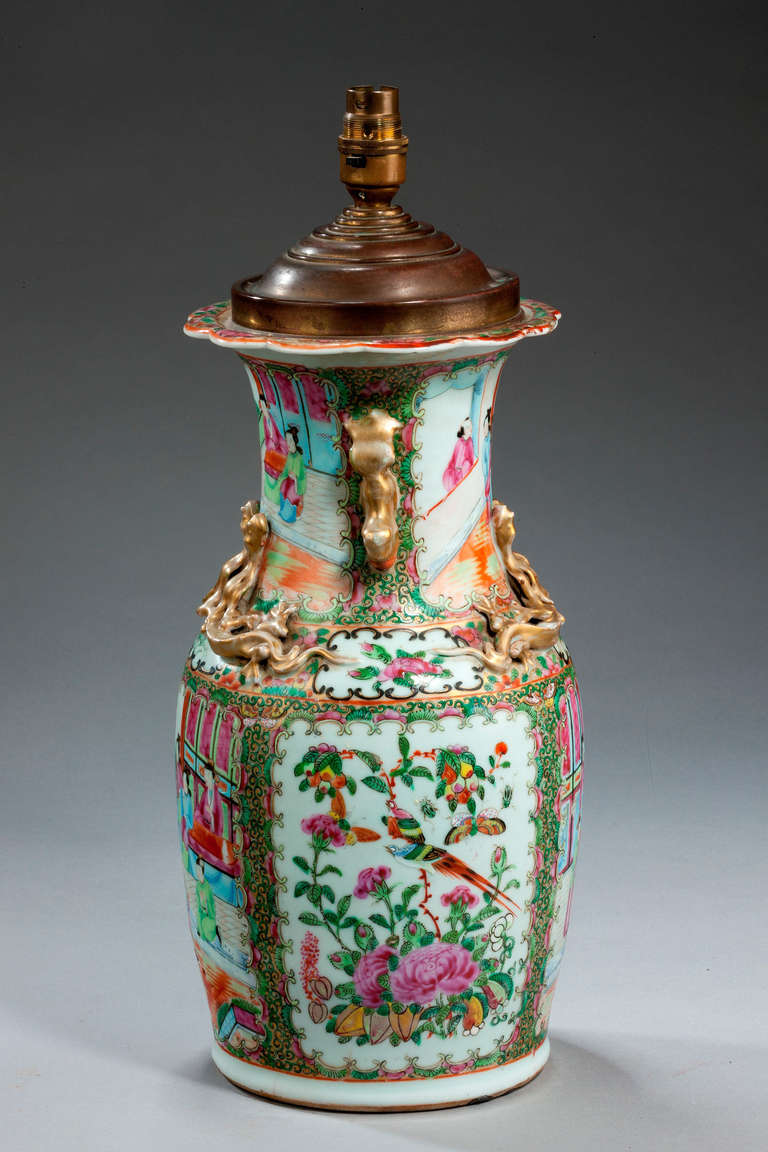 Good 19th century Canton porcelain vase lamp with applied lizard decoration and court scenes within panels.

Shades are not included in the price of our lamps. We do have a competitively priced range of shades for all of our lamps. Please ask for