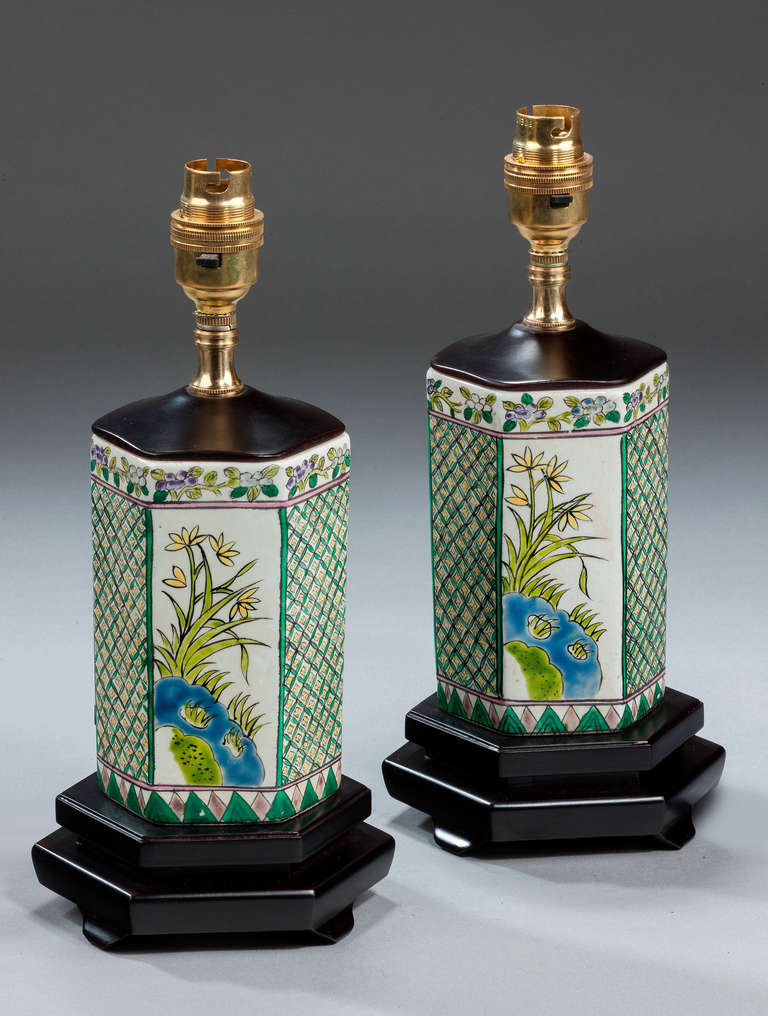 Pair of small Canton design porcelain hexagonal Lamps with bamboo and trellis decoration. Modern.

Canton porcelains are Chinese ceramic wares made for export in the 18th to the 20th centuries. The wares were made, glazed and fired at Jingdezhen but