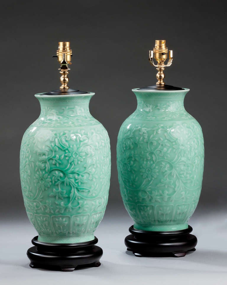 Large pair of celadon green ovoid lamps, with raised moulded decoration. Modern.

Shades are not included in the price of our lamps. We do have a competitively priced range of shades for all of our lamps. Please ask for details with your inquiry or
