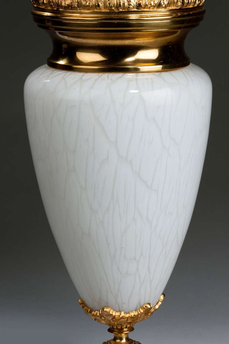 Single mottled glass lamp with gilt bronze. Originally an oil Lamp.

Shades are not included in the price of our lamps. We do have a competitively priced range of shades for all of our lamps. Please ask for details with your inquiry or order.

