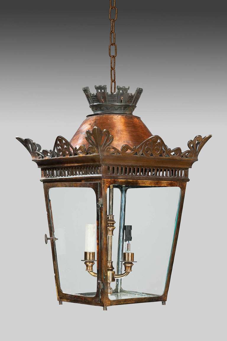 A good, large, patinated bronze, four glass Lantern, the top border pierced with applied scrolls, over of very substantial construction.

