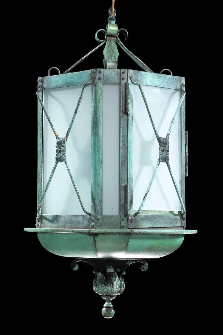 A well patinated bronze hall lantern of very strong construction, octagonal glazed sections to main body with 