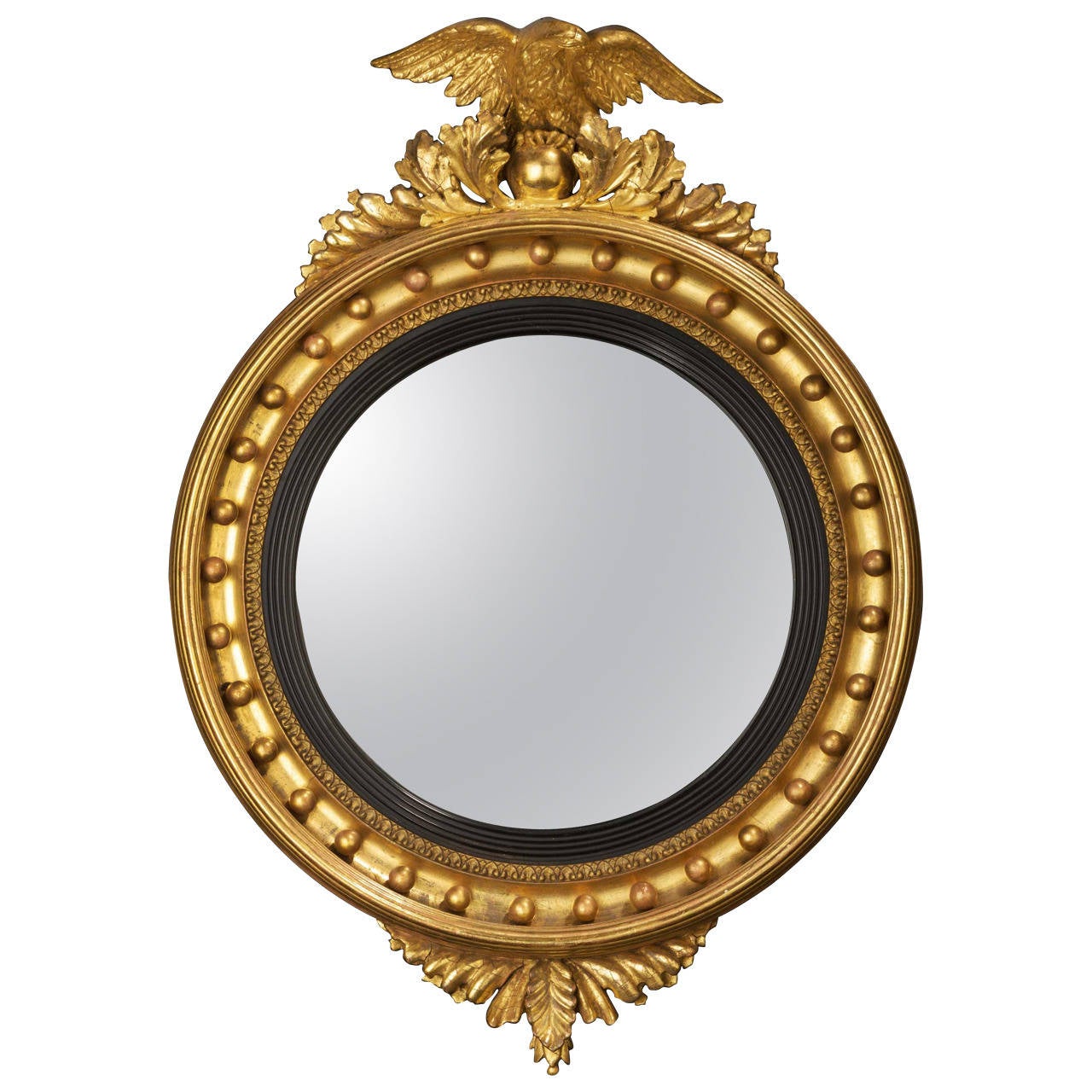 Regency Period Convex Mirror Surmounted with a Small Carved Eagle