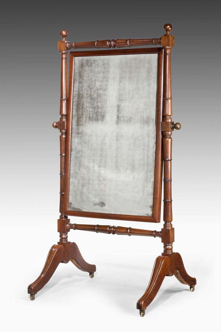 Regency period mahogany frame Cheval Mirror, the frame with turned stretchers.