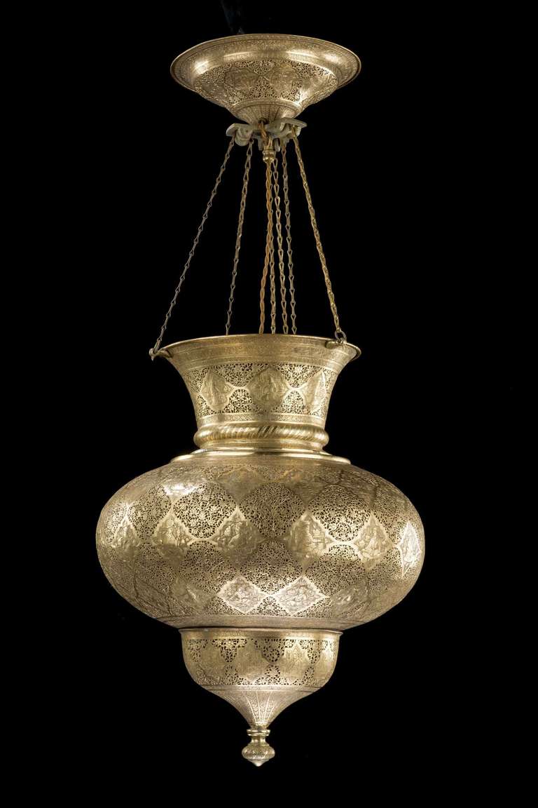 A finely chiseled Qajar lantern with a risen-fall action. Finely engraved and pierced.

The Qajar dynasty (also anglicized as Ghajar or Kadjar) is an Iranian royal family of Turkic origin, which ruled Persia (Iran) from 1785-1925. The Qajar family