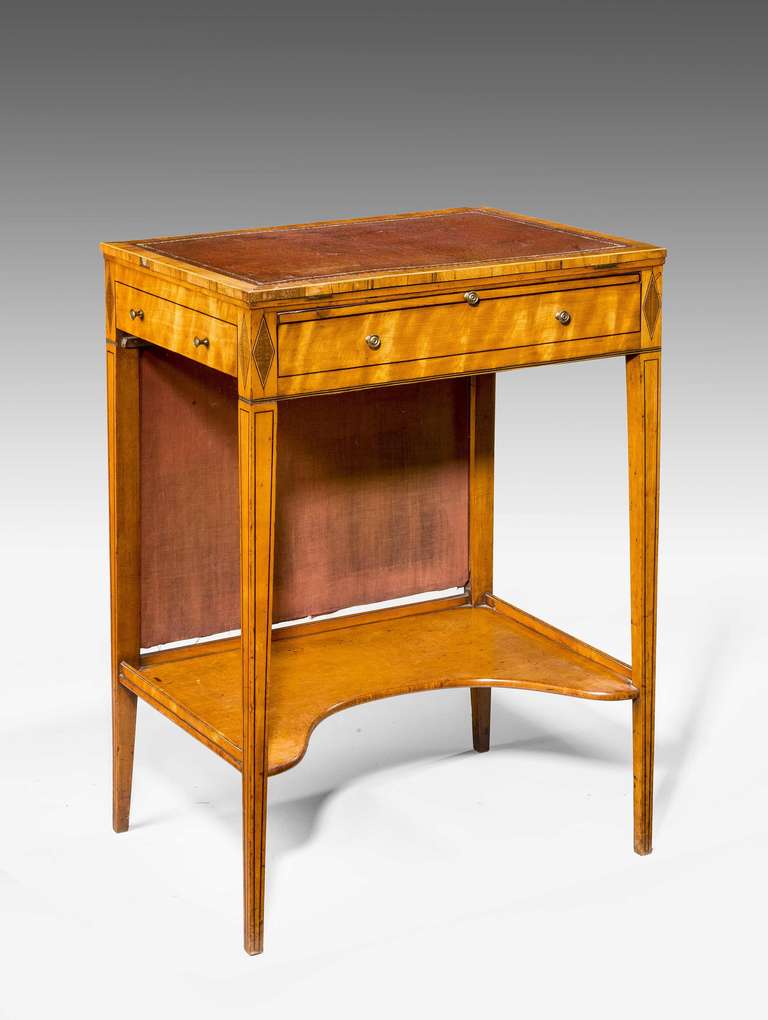 An attractive George III period mahogany writing screen table, the rising top adjustable. A freeze drawer to one side, the screen section rising to protect the ladies complexion from direct heat.
RR.

        