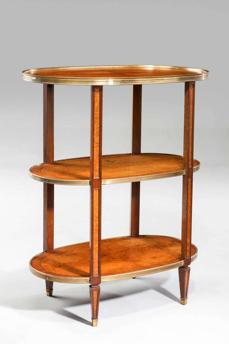 A good Regency period burr amboyna Etagère of fine colour and patina, the edges broadly cross banded, the uprights with reserved amboyna panels.

RR