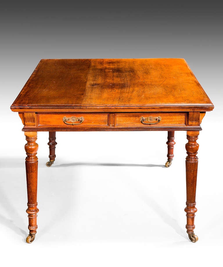 An Arts & Crafts period, mahogany desk from the third quarter of the 19th century.


