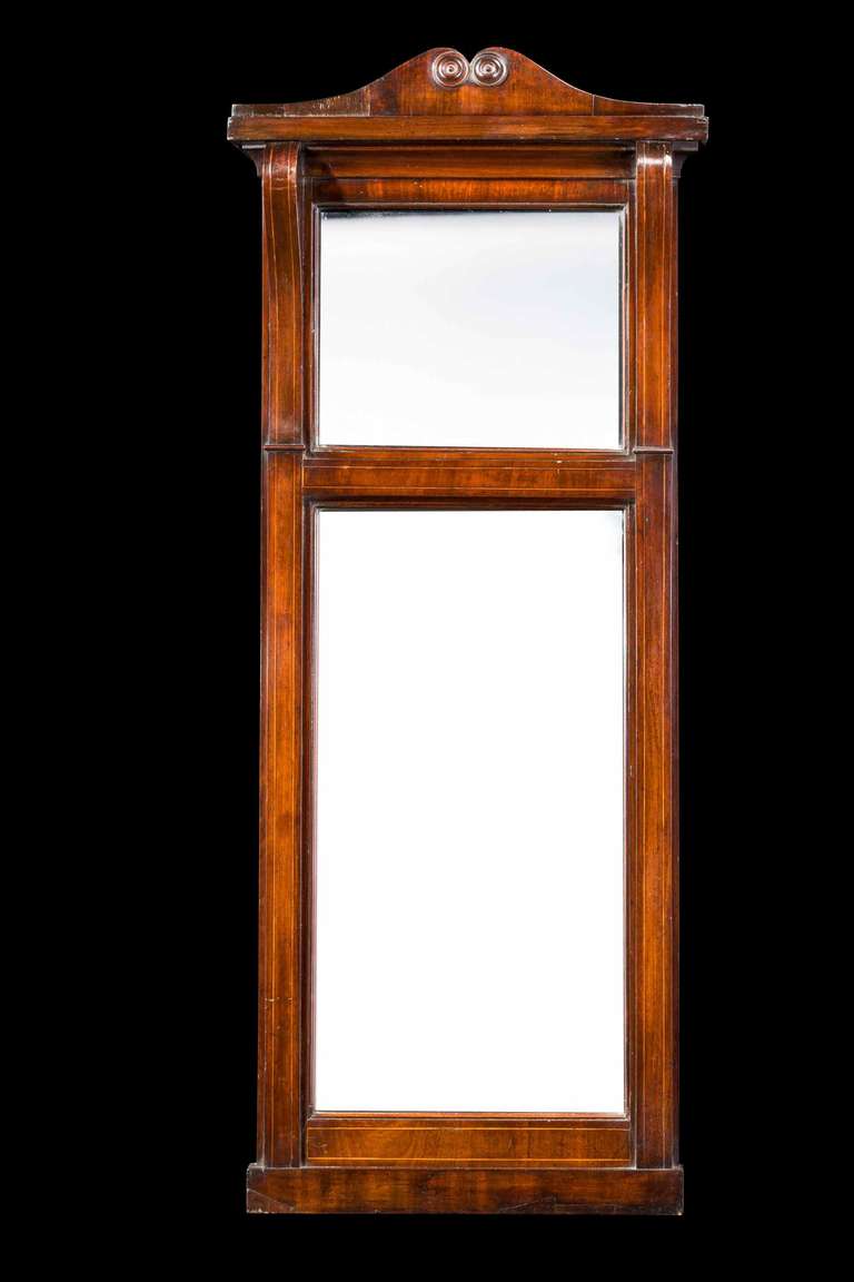 Pair of Regency period pier mirrors, the top section with replacement plates, the supports with fine line boxwood inlay.