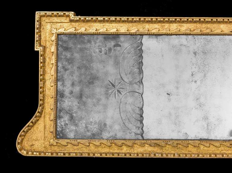 A fine 18th Century Queen Anne period gilt wood Landscape Mirror, retaining two original plates and one later replacement,the inner border with vitruvian scrolls.

RR
