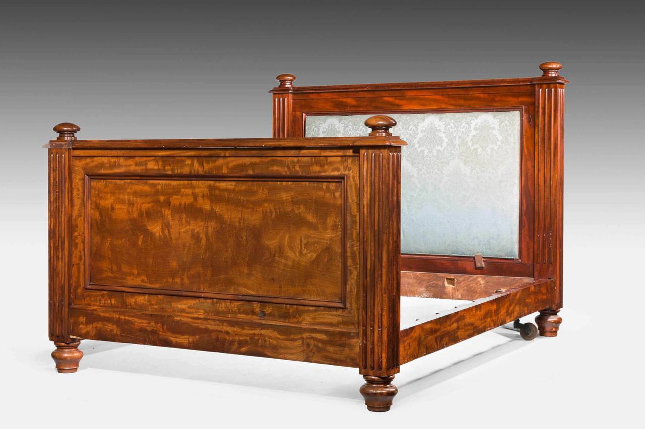 A large mahogany bed previously from one of England's great estates the property of The Earl of Derby and Knowsley. In excellent original condition.

RR.