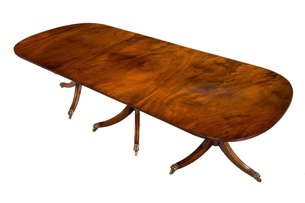 Mid-20th Century Three-Pillar Regency Design Mahogany Dining Table