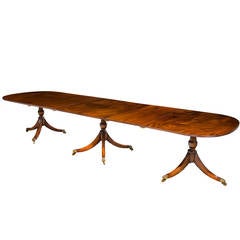 Mid-20th Century Three-Pillar Regency Design Mahogany Dining Table