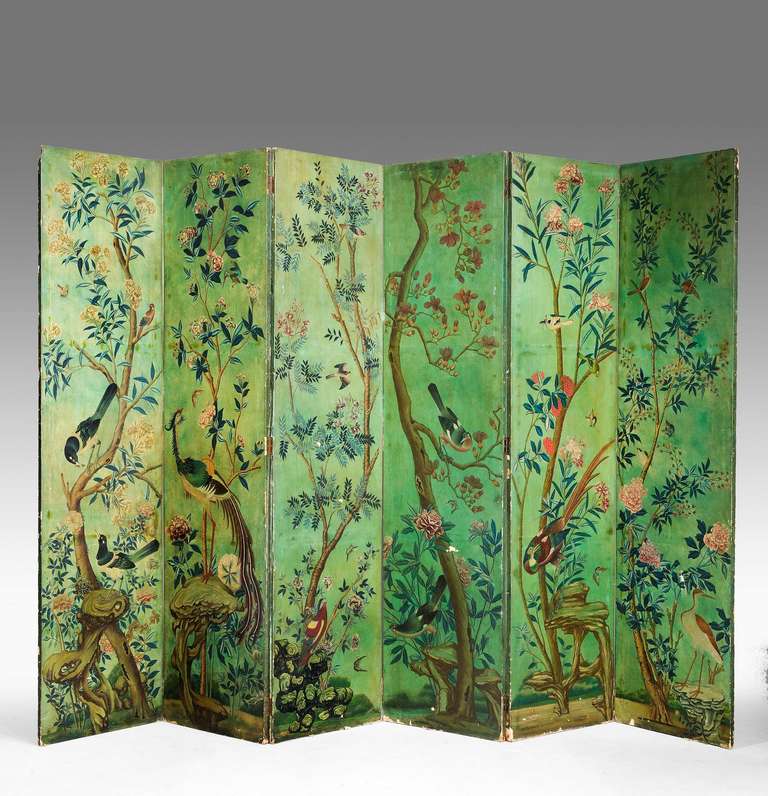 Well painted six fold screen, the decoration of exotic birds and flowers, oils on canvas dating from the mid-19th century.