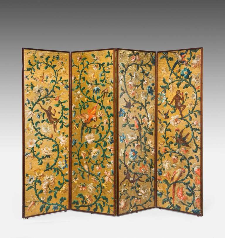 A fine 19th century gold ground four fold screen, the main panels with monkeys seated in exotic foliage and eating fruits, the reverse side of William Morris linen fabric.

RR.