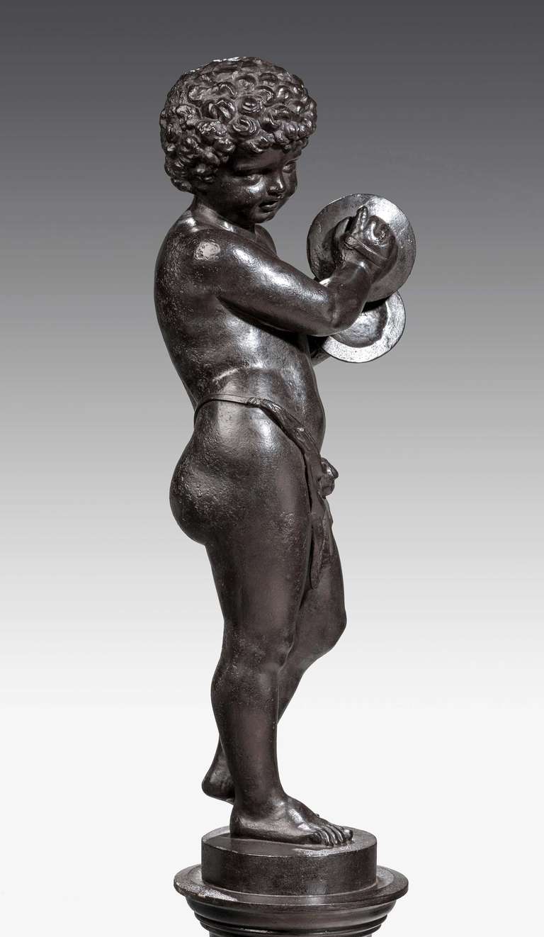 Bronze Patinated Cast Iron Figure of a Putti In Excellent Condition For Sale In Peterborough, Northamptonshire