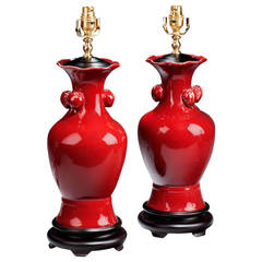 Pair of 20th century 'Sang de Boeuf' Waisted Lamps