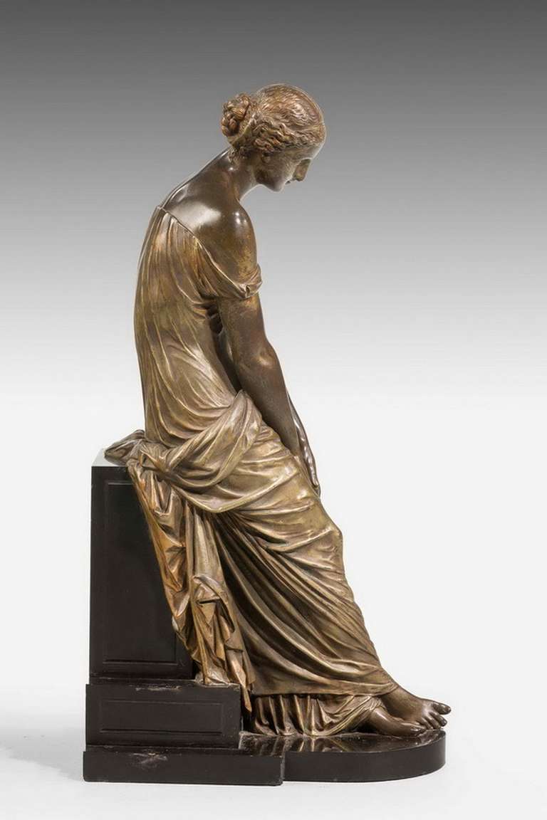 British 19th Century Seated Maiden on a Stepped Black Marble Base