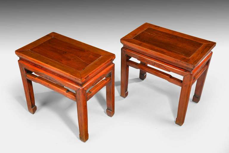 An attractive pair of late 19th century rectangular elm low tables, on sturdy four section supports with cross stretchers. Good dark golden colour. South china, circa 1890-1900