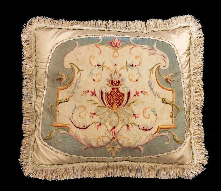 Late 18th century, Gobelin. An armorial central cartouche within a continuous border, wool.

RR