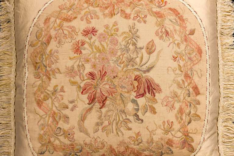 Early 19th century Aubusson of petit point, muted colors on a champagne background. Wool with silk highlights.

RR.