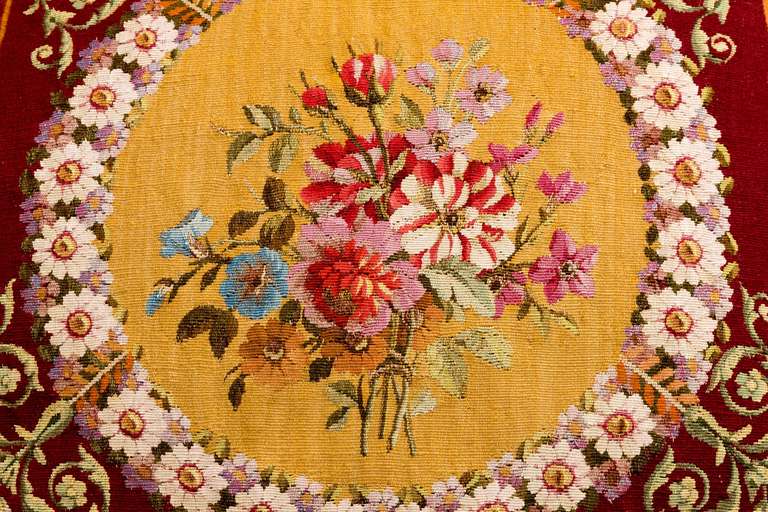 French Cushion: 18th Century, Wool and Silk. A crown of flowers