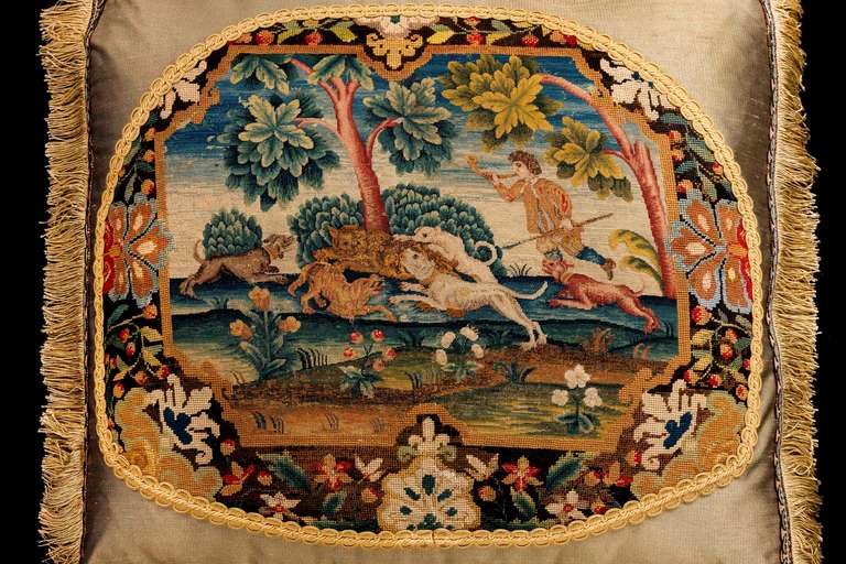 Early 18th century, French grios and petit point wool with finely woven silk highlights. A huntsman with dogs in full chase within a strong border with vibrant colours.

RR