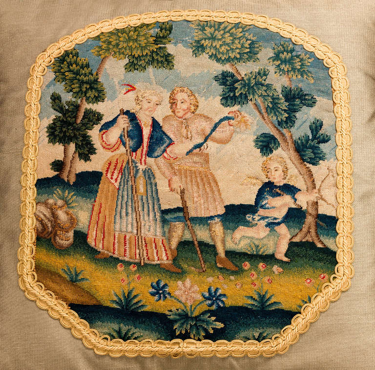 French, mid-18th century petit point wool with silk highlights. Three figures within a garden setting.

RR.