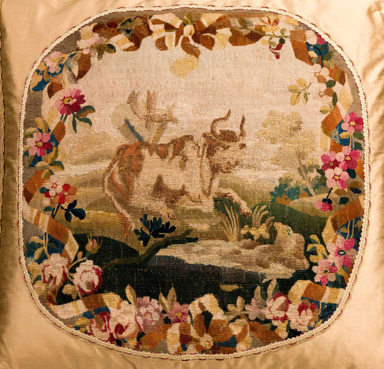 Early 18th century, French, wool with silk highlights. A bovine figure within a rocky and floral landscape. Probably a scene from Aesop’s fables.

RR.