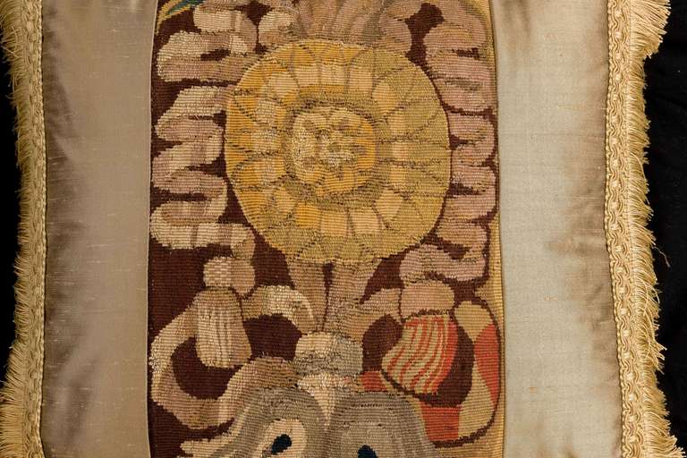 Early 18th century, Flemish tapestry, panels with a silk border.

Near pair with item: 5599a.