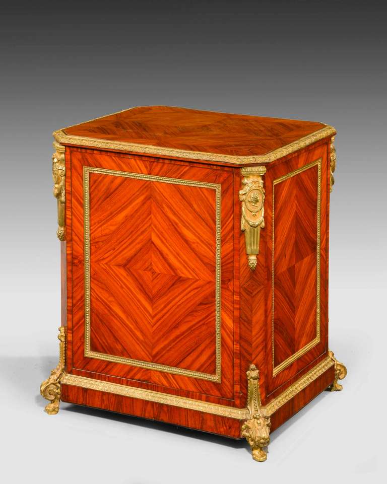 A fine quality, late 19th century elaborate gilt bronze-mounted dwarf cabinet. The surfaces all quartered and crossbanded.

RR.