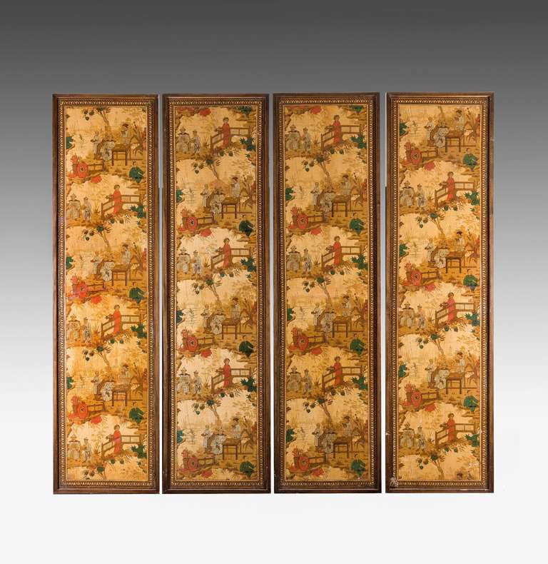 A set of four framed printed and painted fire screen panels with oriental garden designs. 19th century, in medium condition with signs of ageing and wear.