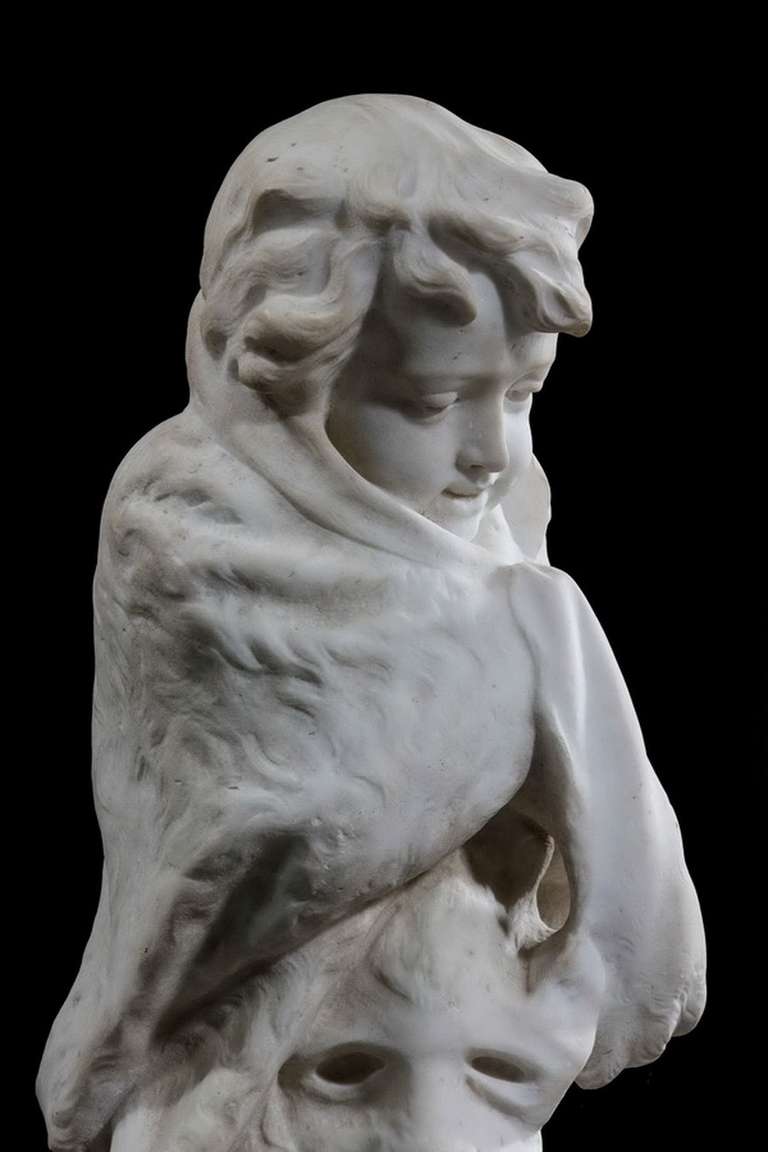 Late 18th century Italian marble figure of a young boy as winter, the surface weathered.