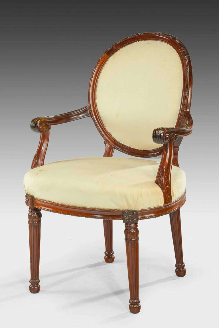 Late 19th century oval back armchair of very sturdy construction with continuous bead decoration to the entire chair, finely carved arms.