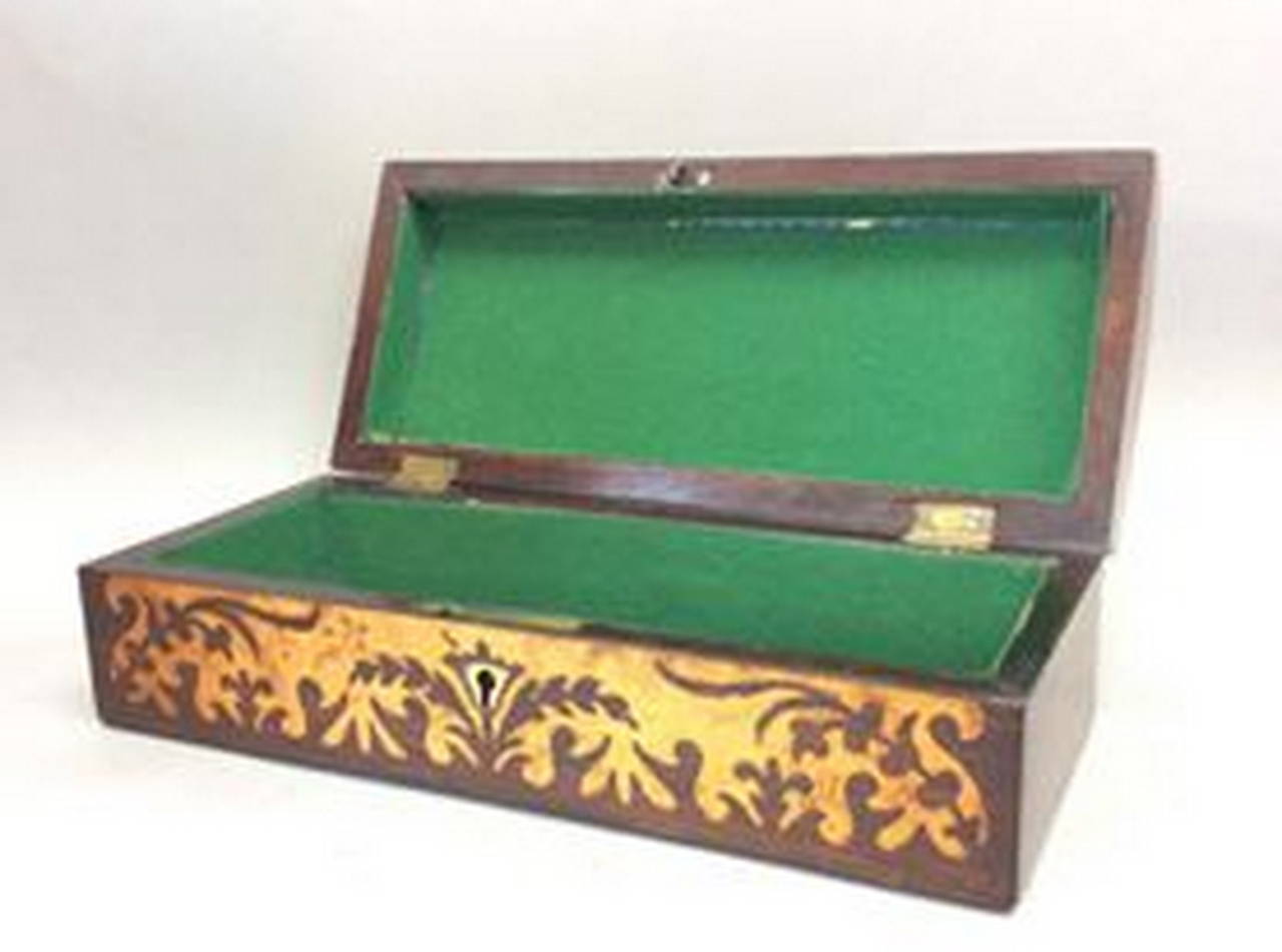 A very good 19th century marquetry and mahogany domed top box complete with key.