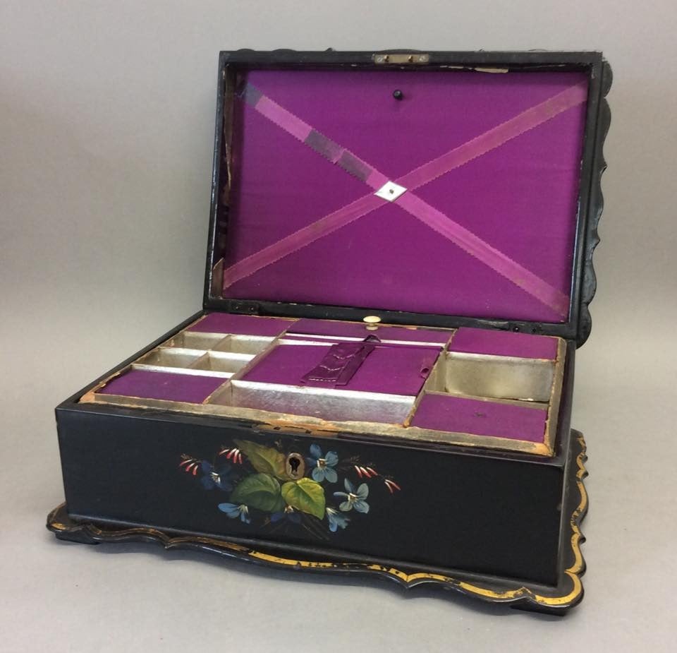 Mid-19th century papier mâché work box with well fitted interior and original silk lining now a little tired in places, complete with original key.