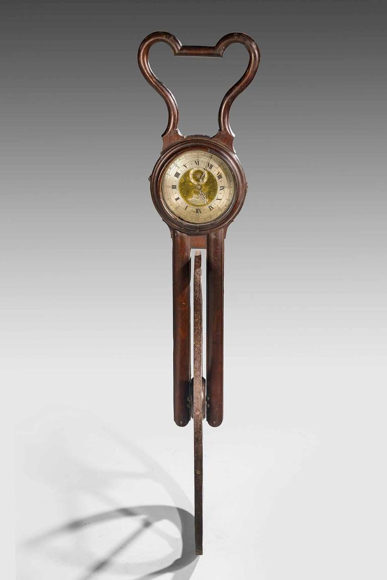 A Heath & Wing Waywiser, English, third quarter of the 18th century. Signed to dial Heath & Wing, Strand, London, with silvered dial divided for Furlongs and Miles,  brass centre, six-spoke wheel with steel rim tread, mahogany fork body with shaped