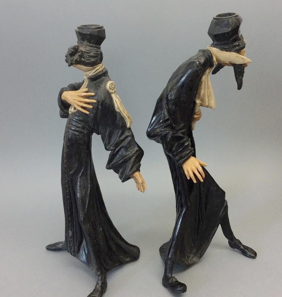 Pair of cold cast 19th century lead Austrian figures depicting French lawyers with repairs retaining their original decoration.
