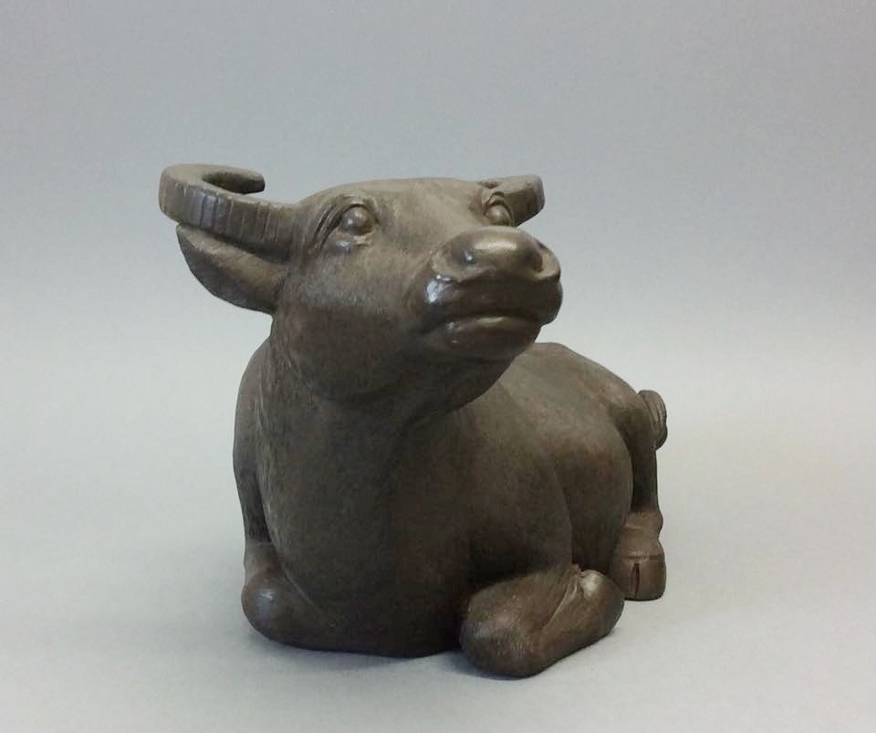 20th century terracotta water buffalo with a bronzed finish with carefully sculptured skin with seal mark to the underside.