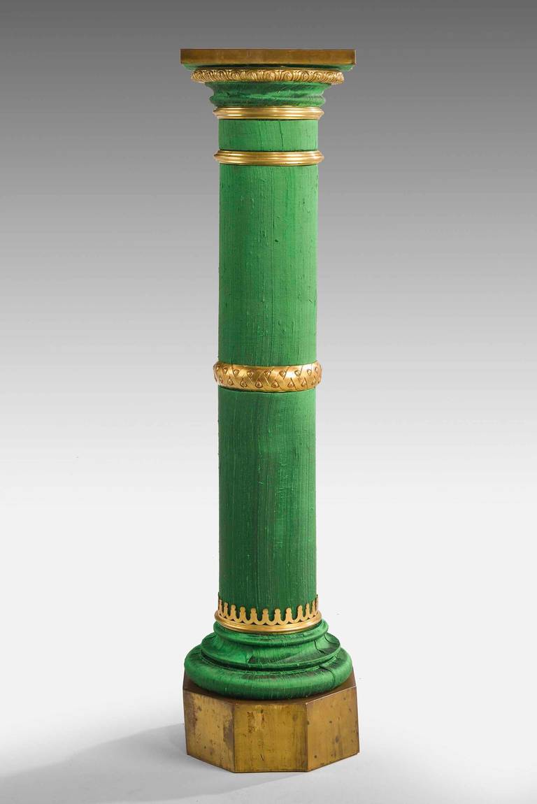 An unusual gilt bronze circular column with silk inset panels. The gilding to the turnings original.